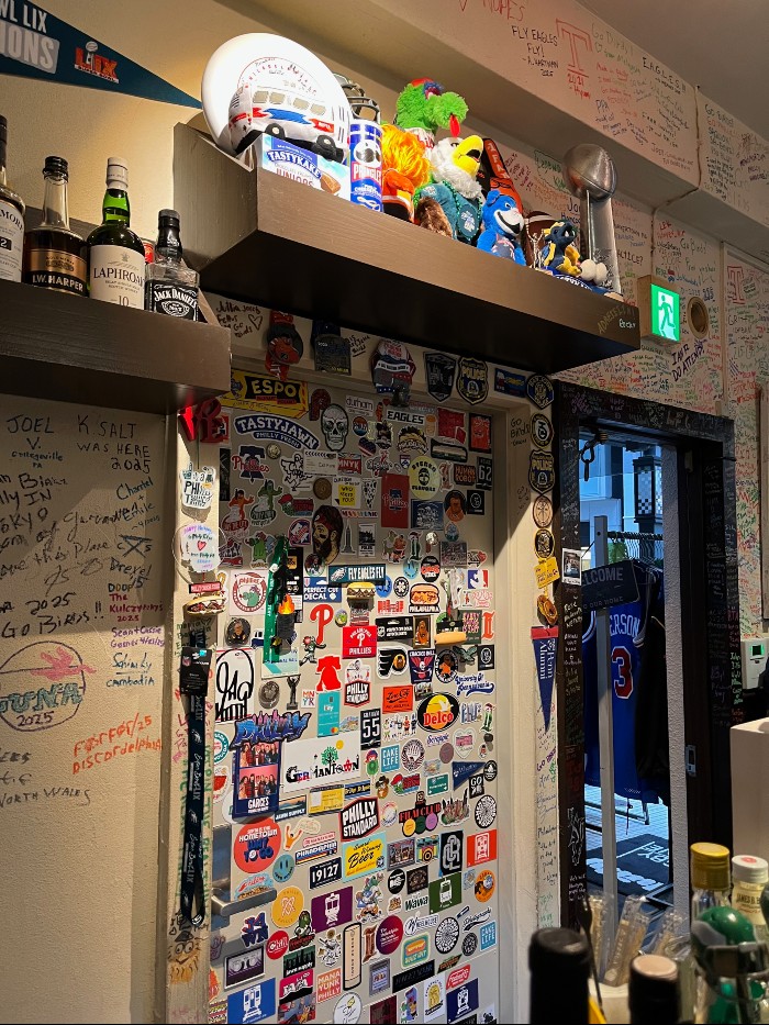The walls are covered with little Philly doodads and customer graffitti