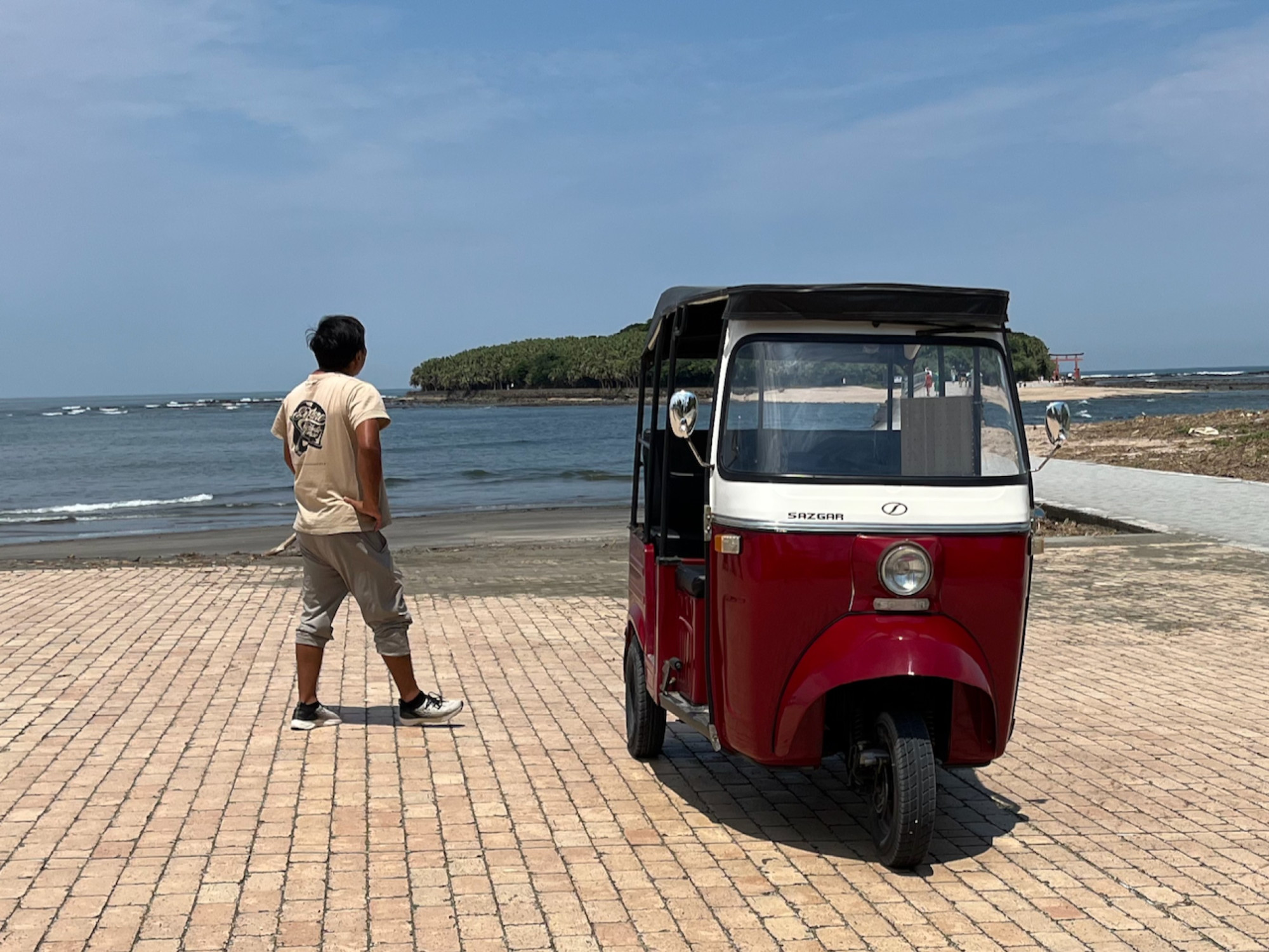 Our tuk-tuk and driver who gave us a little 5 minute tour of the island.