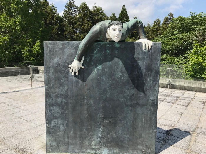 Unique statue of escaping man - there is even a back side to this one!