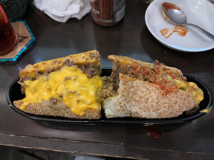 My cheesesteak after adding ketchup and taking a big bite!