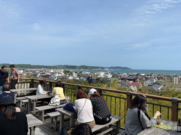 Lower picnic deck view of the sea and town below.
